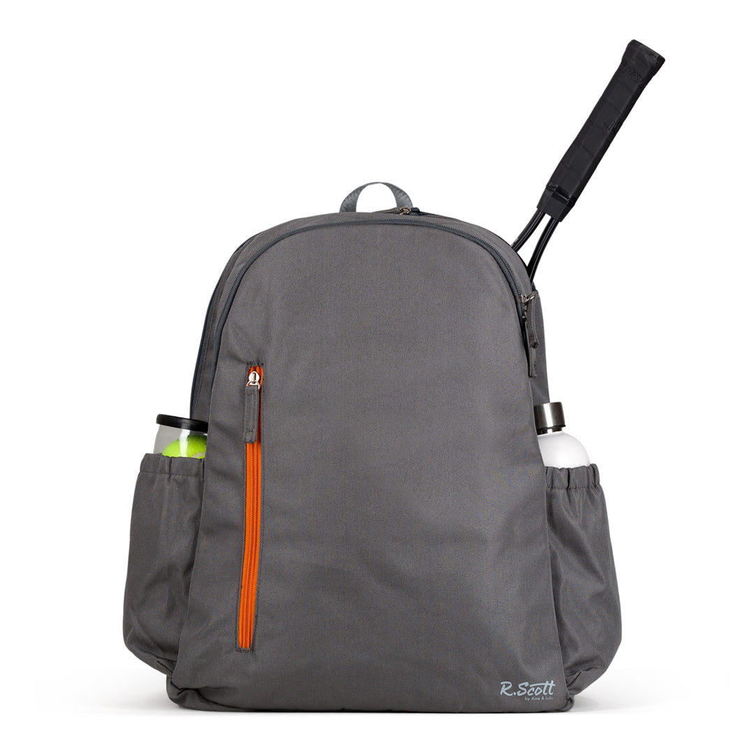view of charcoal grey mens R Scott tennis backpack. There is a water bottle and tennis balls in the side pockets. Front has bright orange zipper to front pocket.