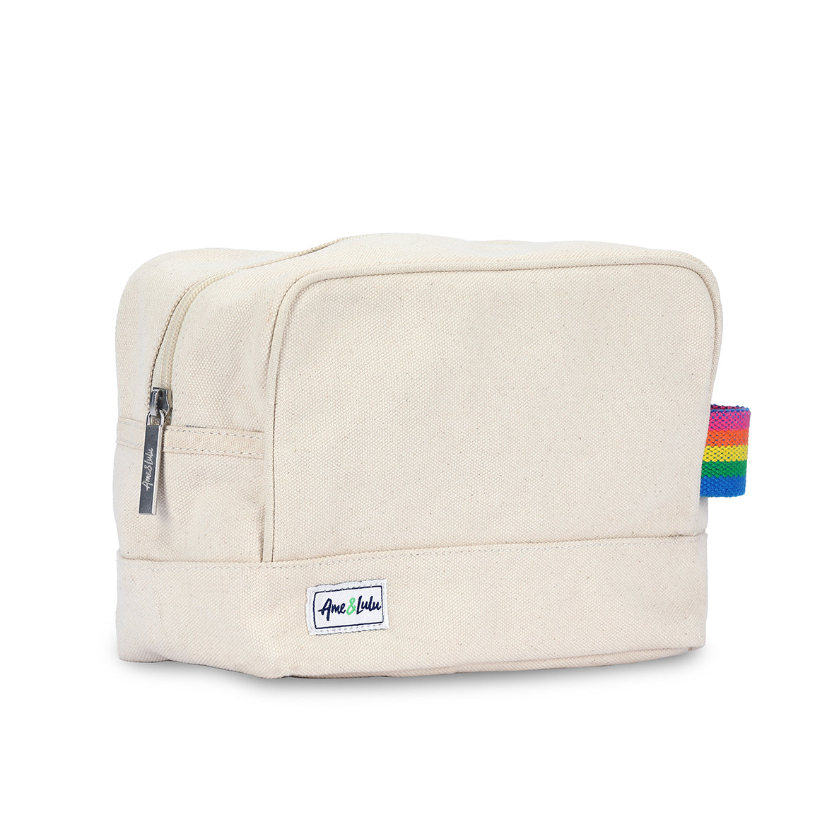 side view of natural canvas beauty bag with rainbow striped cotton webbing loop on the side