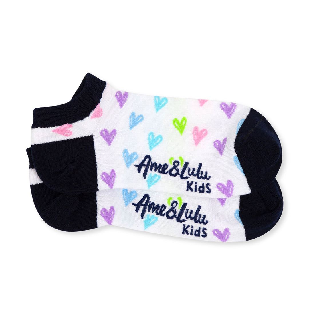pair of white kids socks with navy heel and toes and rainbow hearts stitched on sock