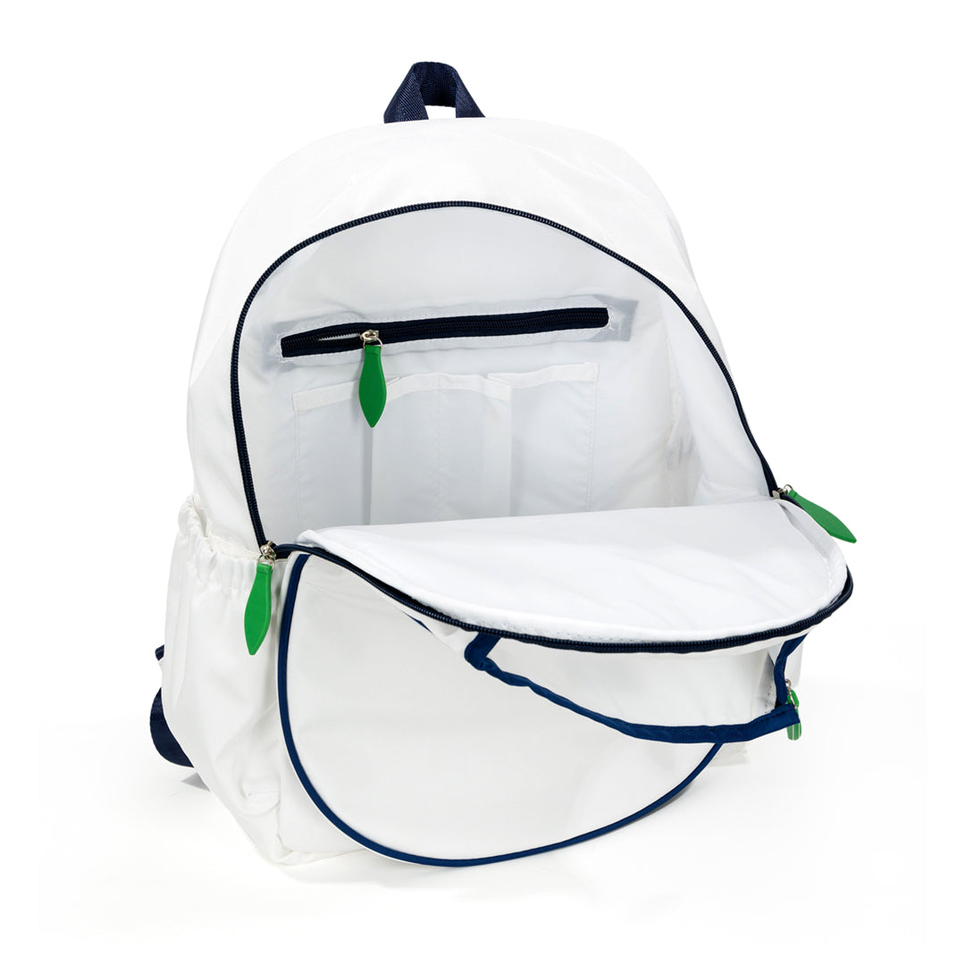 Inside view of white tennis backpack with racquet pocket. Bag has navy trim and green zipper pulls. Has one pocket inside.