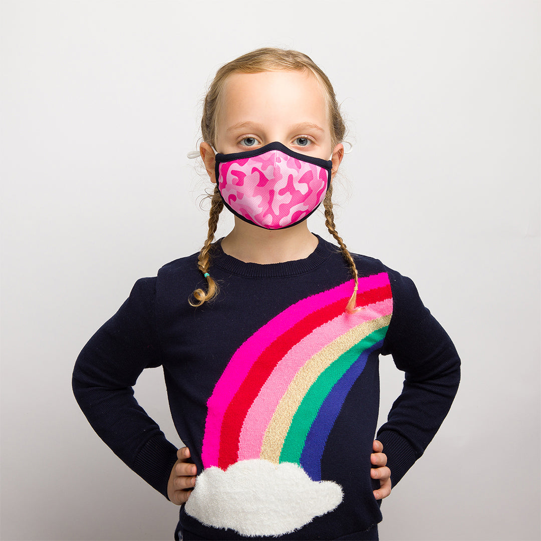 girl wearing hot pink camo kids face mask