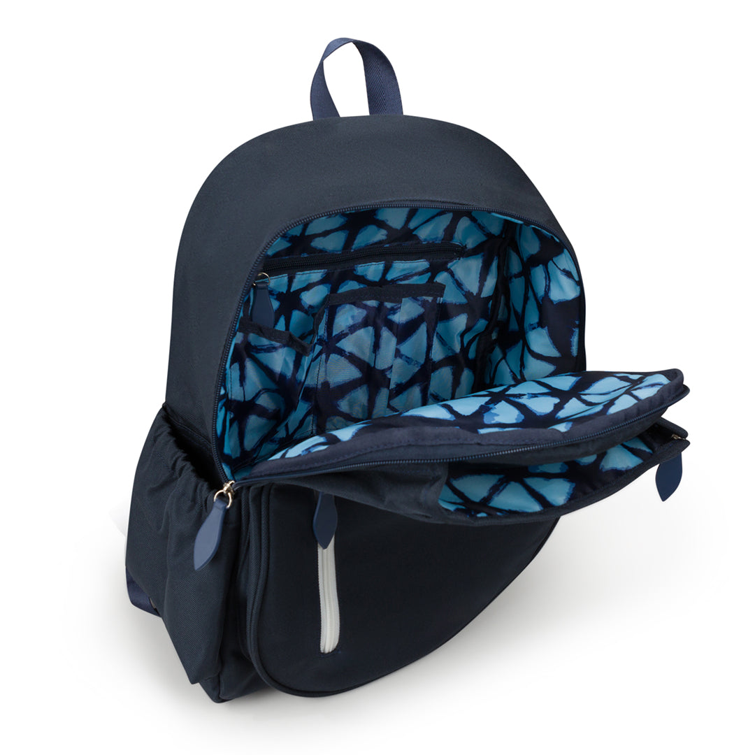 Inside view of navy game time tennis backpack showing inside pattern of navy and blue tie dye shibori print.