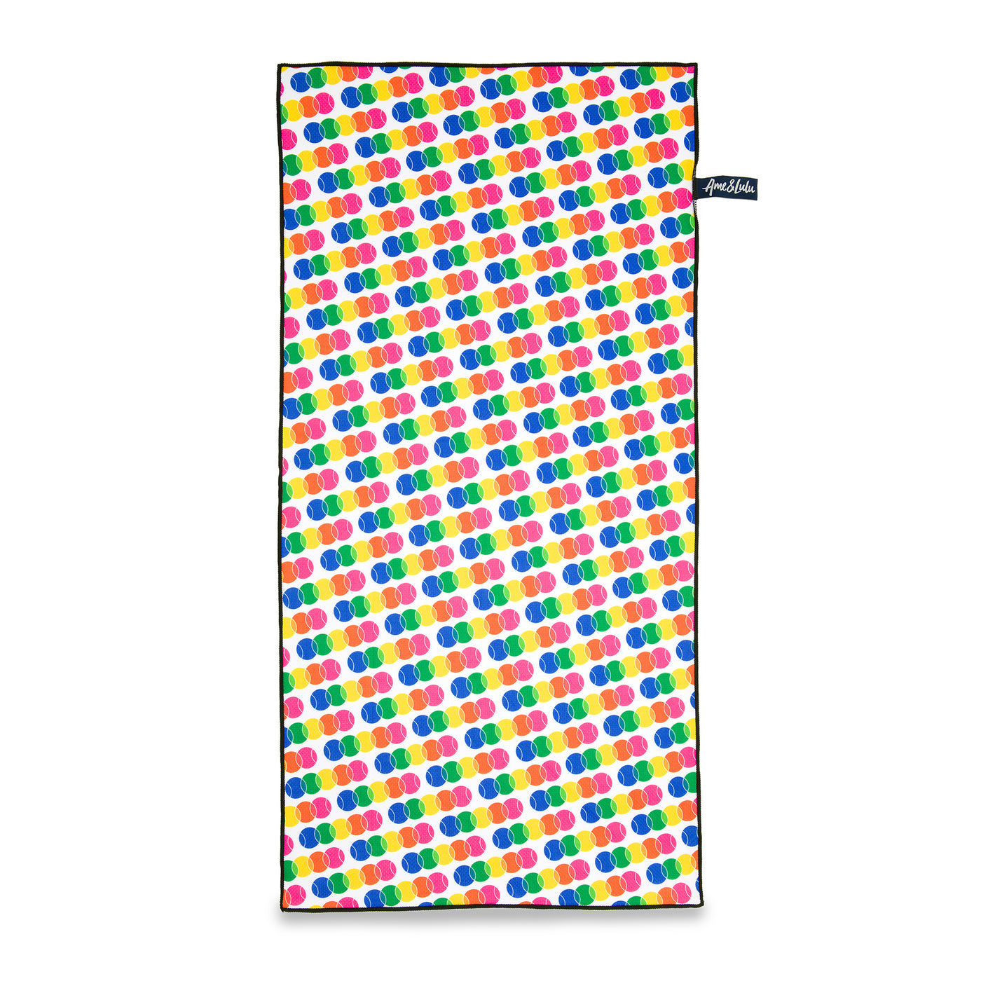 rectangular white towel printed with repeating rainbow tennis balls pattern