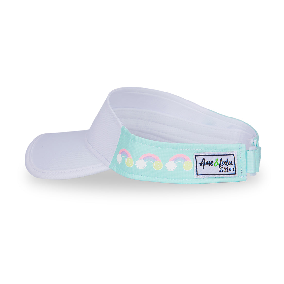 Side view of light blue kids visor with rainbows and tennis balls printed on the sides.